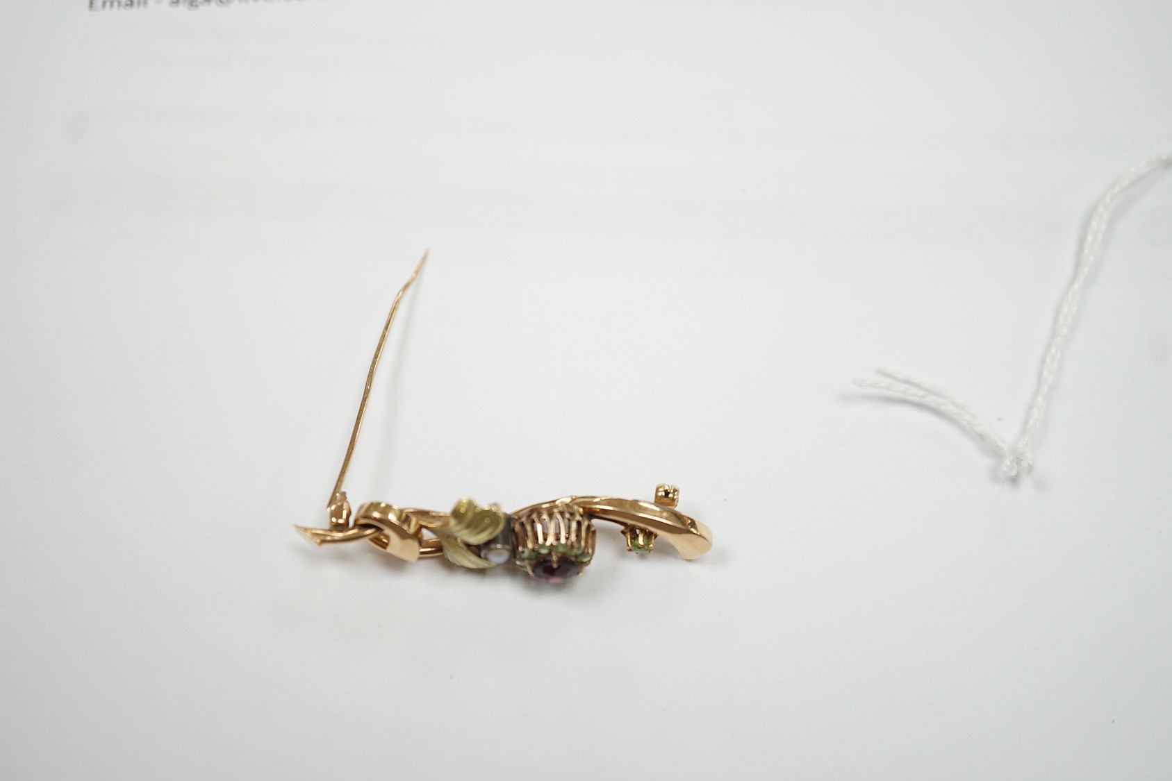 An early to mid 20th century Russian 56 zolotnik yellow metal, garnet? and split pearl set foliate brooch, 48mm, gross 4.3 grams.